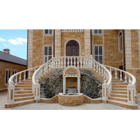 Балюстради та балясини у фасадному декорі сучасного заміського будинку